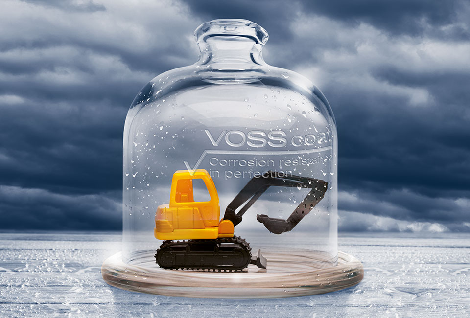 Das Bild zeigt einen Bagger dessen hydraulische Verbindungstechnik durch den Korrosionsschutz VOSS coat bestens geschützt ist.